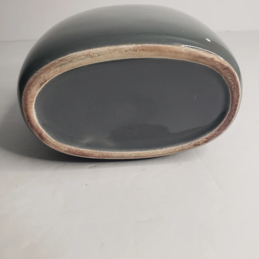 Ceramic toothbrush and toothpaste holder. 171